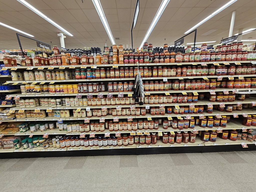 I stood in front of this entire wall of pasta sauce looking for something that was actually still family owned